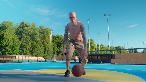 Bald Basketball Player In The Park