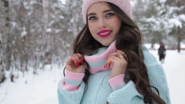 Stylish Young Woman Walking Towards Winter Forest