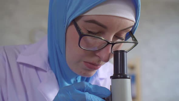 Muslim Woman Chemist Scientist National Scarf Working Microscope Laboratory Close Up