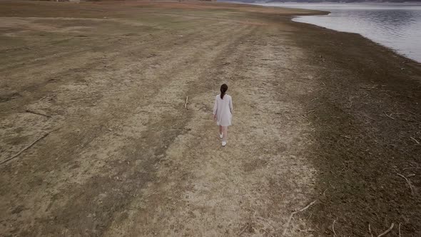 Young girl in cloudy weather