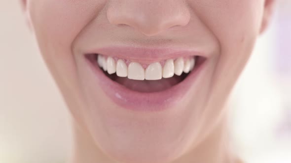 Portrait of Beautiful Smile of Young White Woman