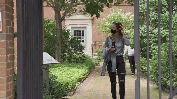 After months of restriction young woman wearing mask can finally enjoy fresh air