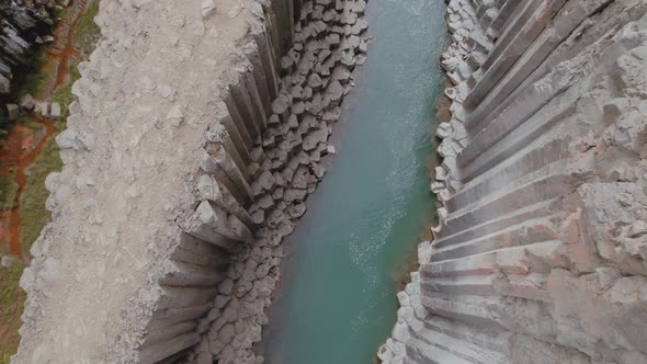 Amazing Shot From Above of the Beautiful Basalt Pillars with River in Middle