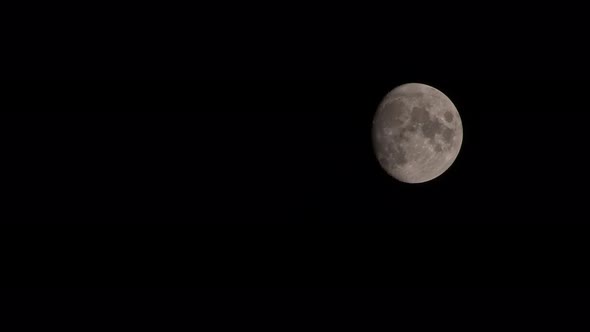 Full Moon And Dark Clouds In The Night