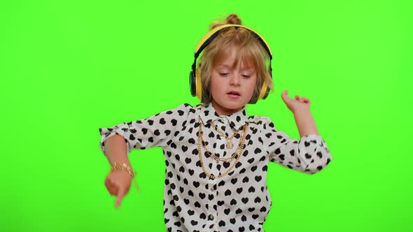 Funny Playful Blonde Child Kid Listening Music Via Headphones Dancing Disco Fooling Having Fun Party