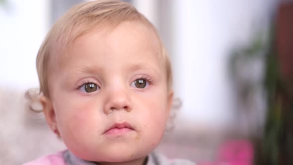 Close Up of the Face of a Child Looking Straight