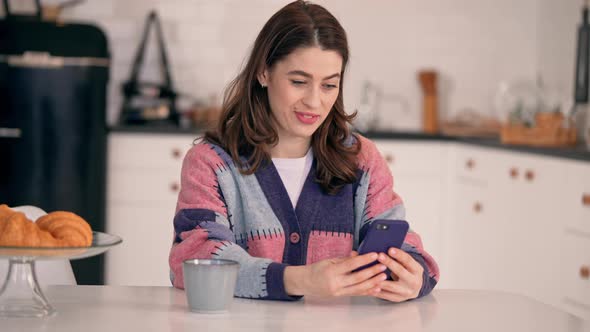 Caucasian Female Has Video Call at Home