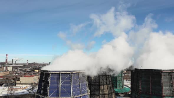 Industrial Smoke Stack Pipes Pollute Air with Toxic Emissions