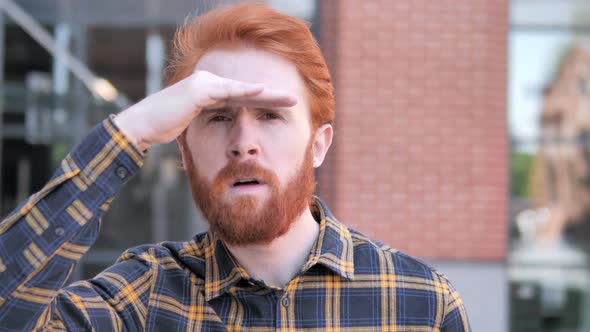 Searching Redhead Beard Young Man Outdoor