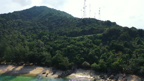 Aerial top view landscape of beautiful bay beach vacation by blue green lagoon and white sandy backg