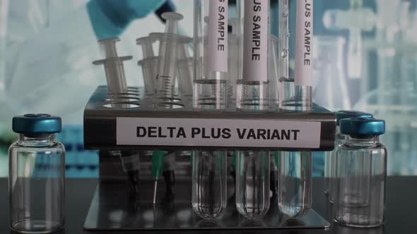 Delta Plus Variant Test Tube Samples Being Removed From Rack. Locked Off