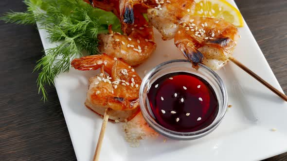 Shrimp Kebabs with Lemon and Sauce  Seafood on a White Plate