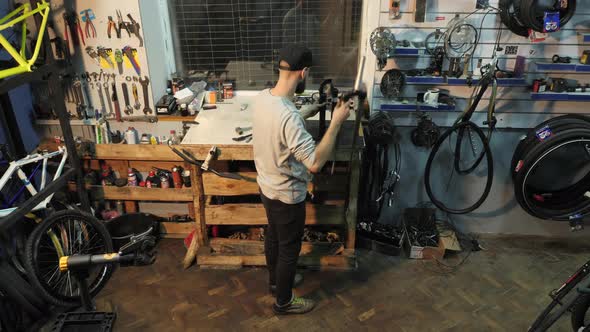 Mechanic repairing a bike fork