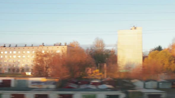 Shooting Autumn Landscape Outside the Window of a High-speed Train