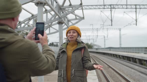 Seniors Shooting Video on Train Station