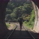 Woman Walking in Tunnel - VideoHive Item for Sale