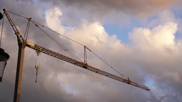 Crane on the Background of Clouds