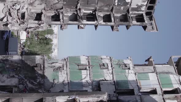 Vertical Video of a Multistorey Building Destroyed During the War in Ukraine