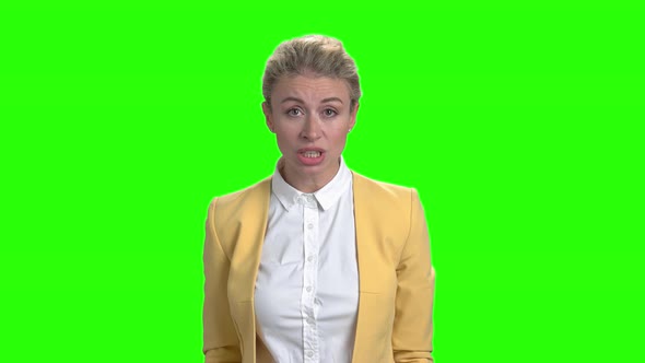 Annoyed Business Lady Is Arguing on Green Screen.