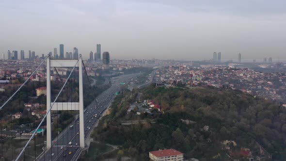 aerial video of Fatih Sultan Mehmet Bridge on a foggy day in Istanbul, Turkey