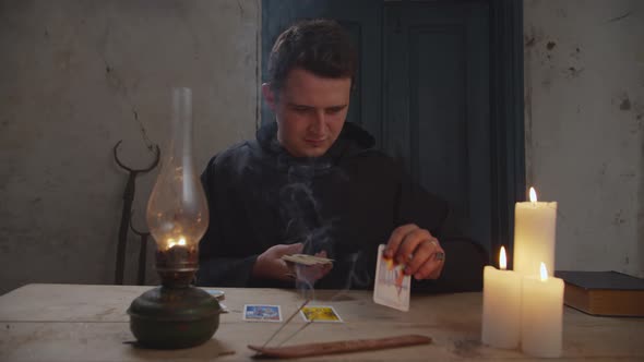 Black Magician Practicing Tarot Cards Reading