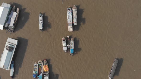 Aerial: flying over Cai Rang floating market in the morning, Can Tho, Vietnam