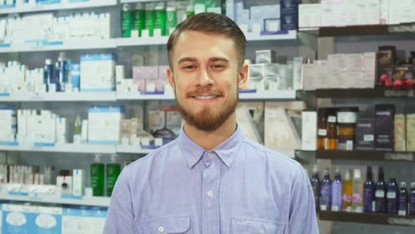 The Man Made a Purchase in a Drugstore and Showing Thumbs Up