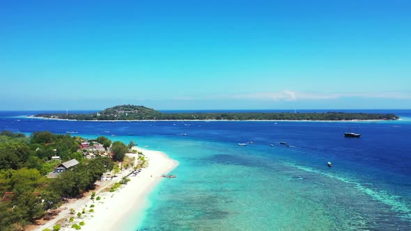 Aerial above abstract of beautiful coastline beach trip by turquoise lagoon and clean sand backgroun