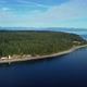 Aerial view of lighthouse, ocean and mountains - VideoHive Item for Sale