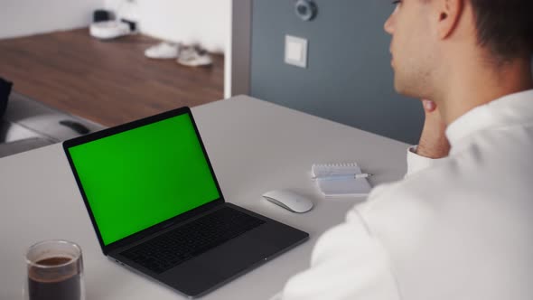 Person Using Video Conferencing Technology From Home for Video Call Green Screen