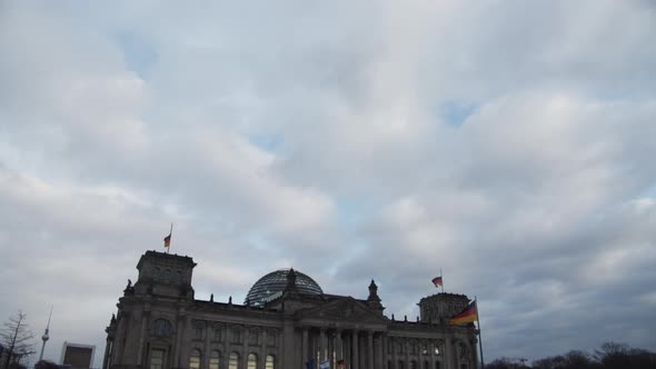 Cloudy Sky Tilt Down Reveal of Historic and Famous Building of German Parliament