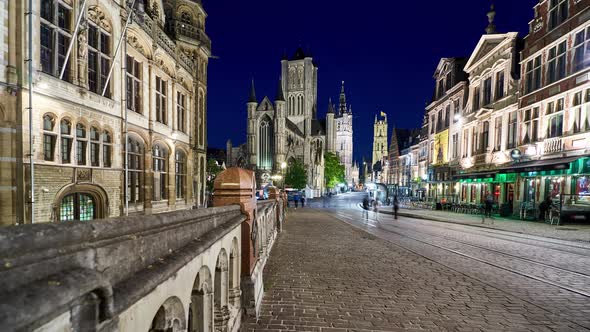 Ghent night timelapse showing the main historic street and church. Belgium