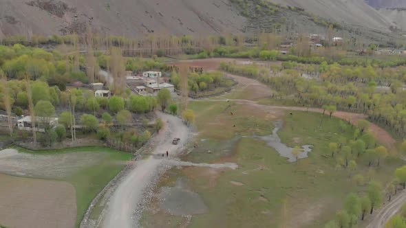 Aerial Over Local Ghizer Valley Village In Pakistan. Slow Parallax View