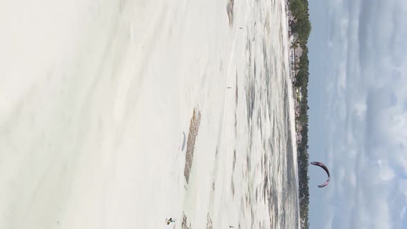 Vertical Video of Low Tide in the Ocean Near the Coast of Zanzibar Tanzania Aerial View