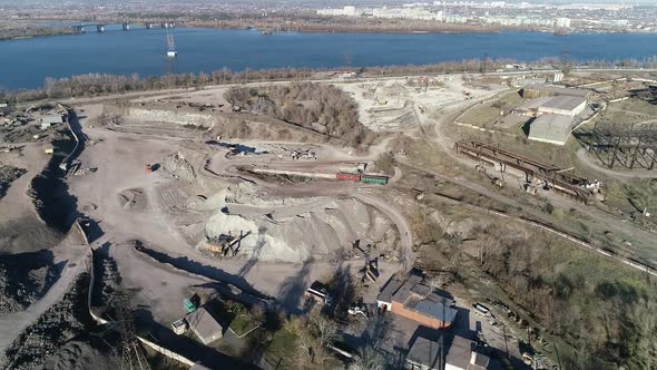 Landscape View of a Huge Construction Site Near the Shores of the River