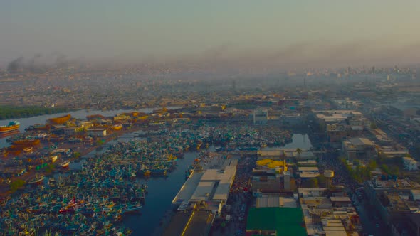 A fishries and fishermen society top view with hundereds of ships.