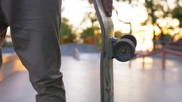 Close Up Shot of Skateboarder in a Concrete Skate Park