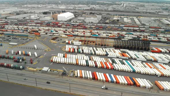 Aerial Pan from Shipping Containers to Railway Station