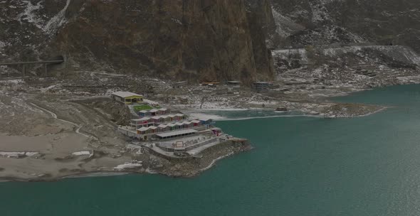 Aerial View Of Luxus Hunza Hotel Beside Attabad Lake In Pakistan. Parallax Shot