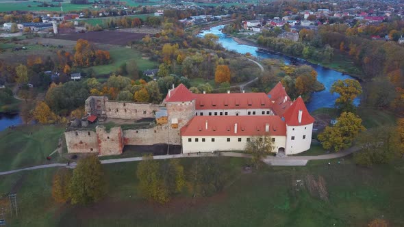 Bauska Medieval Castle Ruins Complex and Park From Above Aerial Shot 4K Video