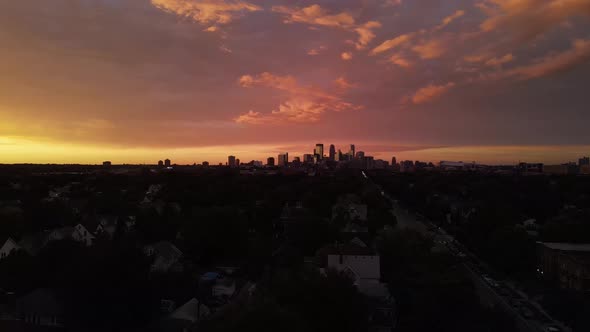 colorful clouds during sunset over minneapolis aerial view