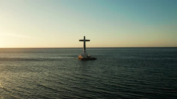 Sunken Cemetery Cross in Camiguin Island, Philippines.