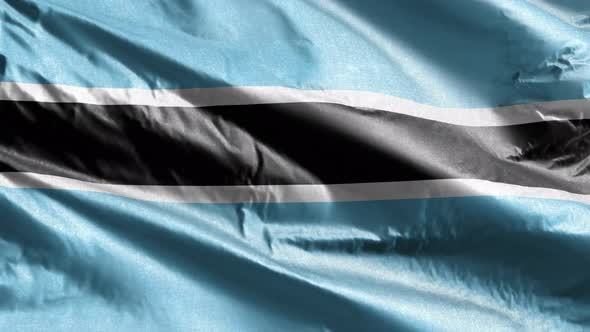 Botswana textile flag waving on the wind. 10 seconds loop.