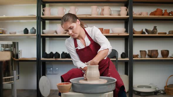 Pottery Workshop Female Potter Makes a Pitcher Out of Clay Handicraft Production of Handmade