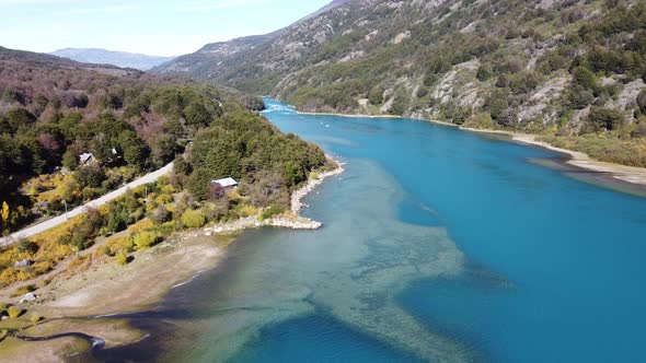 Top Aerial Drone View of the impressive Baker River and Carretera Austral road. Bird Eye View over T