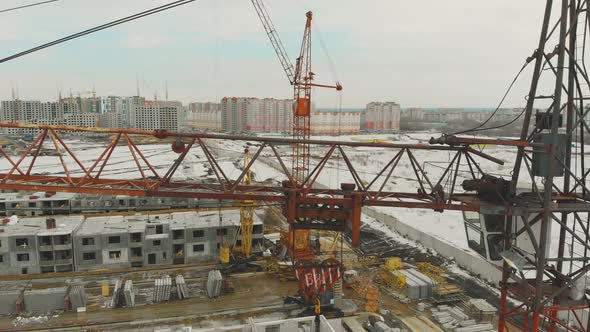 Large Rusty Construction Crane Pillar on Undone Building