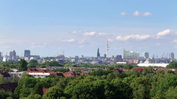 Time lapse of Hamburg skyline with Elbphilharmonie, Heinrich Hertz Tower, Hafecity and clouds moving