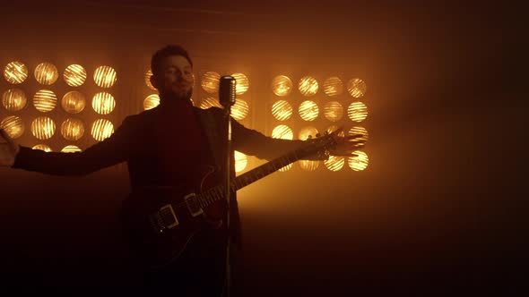 Man Singer Performing Song in Nightclub