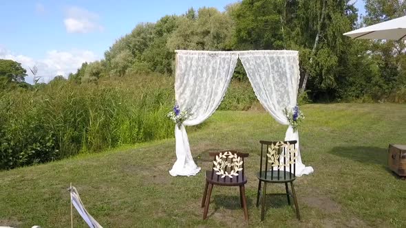 Perfect aerial flight fly backwards slow motion drone shot of a perfect free wedding location in fro