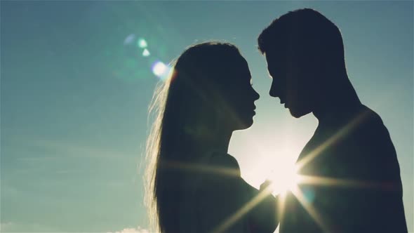 Silhouettes of Loving Man and Women